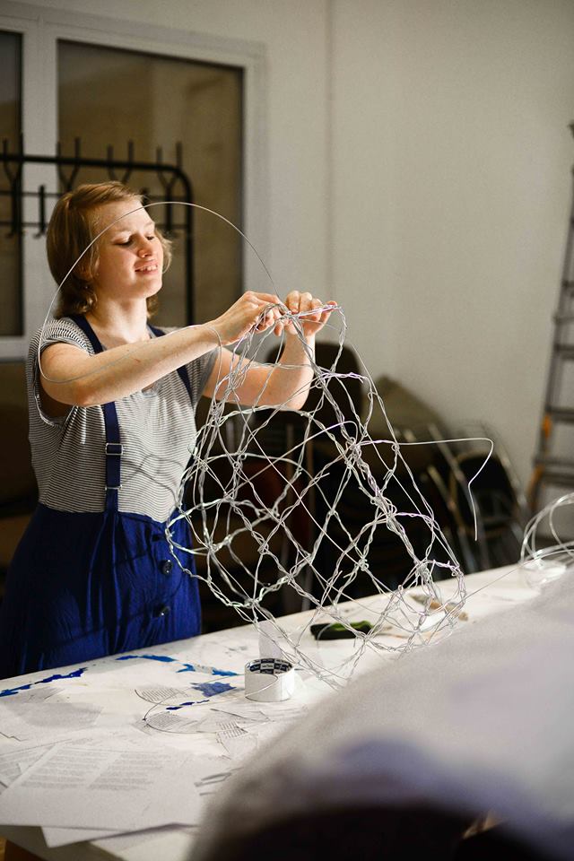 Fox Larsson working on wire sculpture